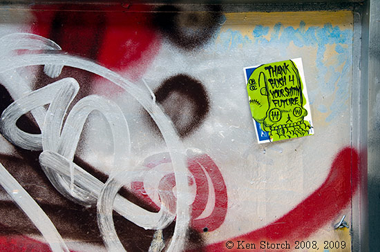 thank-bush-16841 Grafitti and sticker in window of a failed store on the Lower East Side